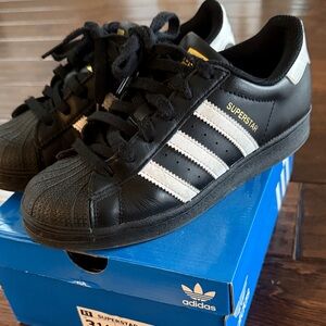 adidas Kids Superstar Sneakers in Black and White with Gold Accents Size 3 1/2